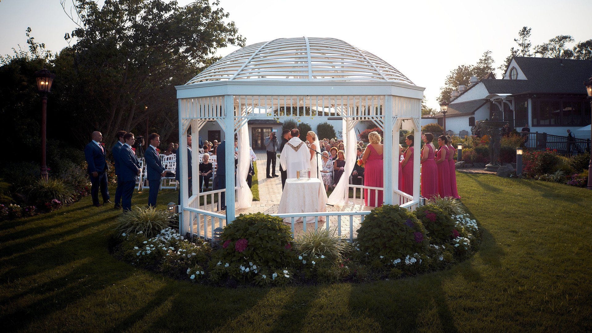 Outdoor Waterfront Ceremony at Riviera Waterfront Mansion Long Island wedding venue in Massapequa, NY — 1