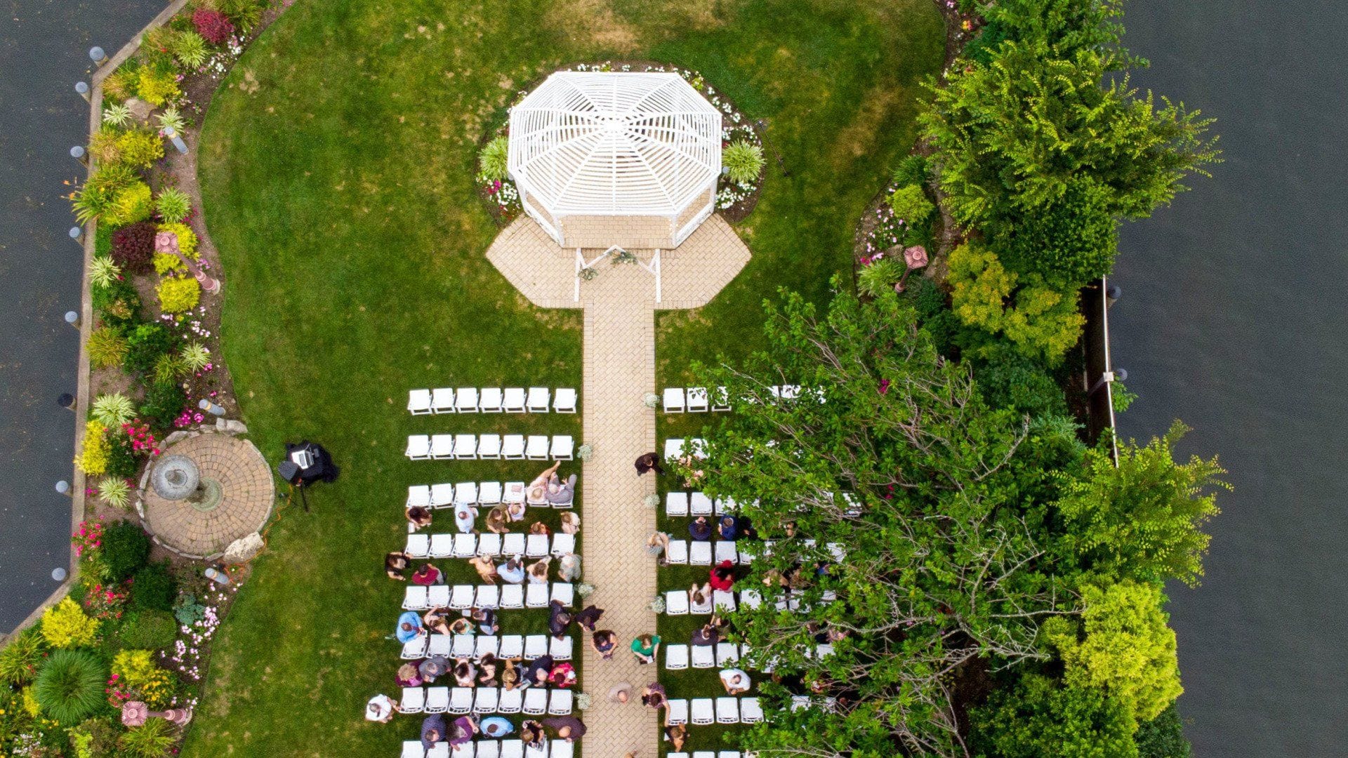 Outdoor Waterfront Ceremony at Riviera Waterfront Mansion Long Island wedding venue in Massapequa, NY — 6